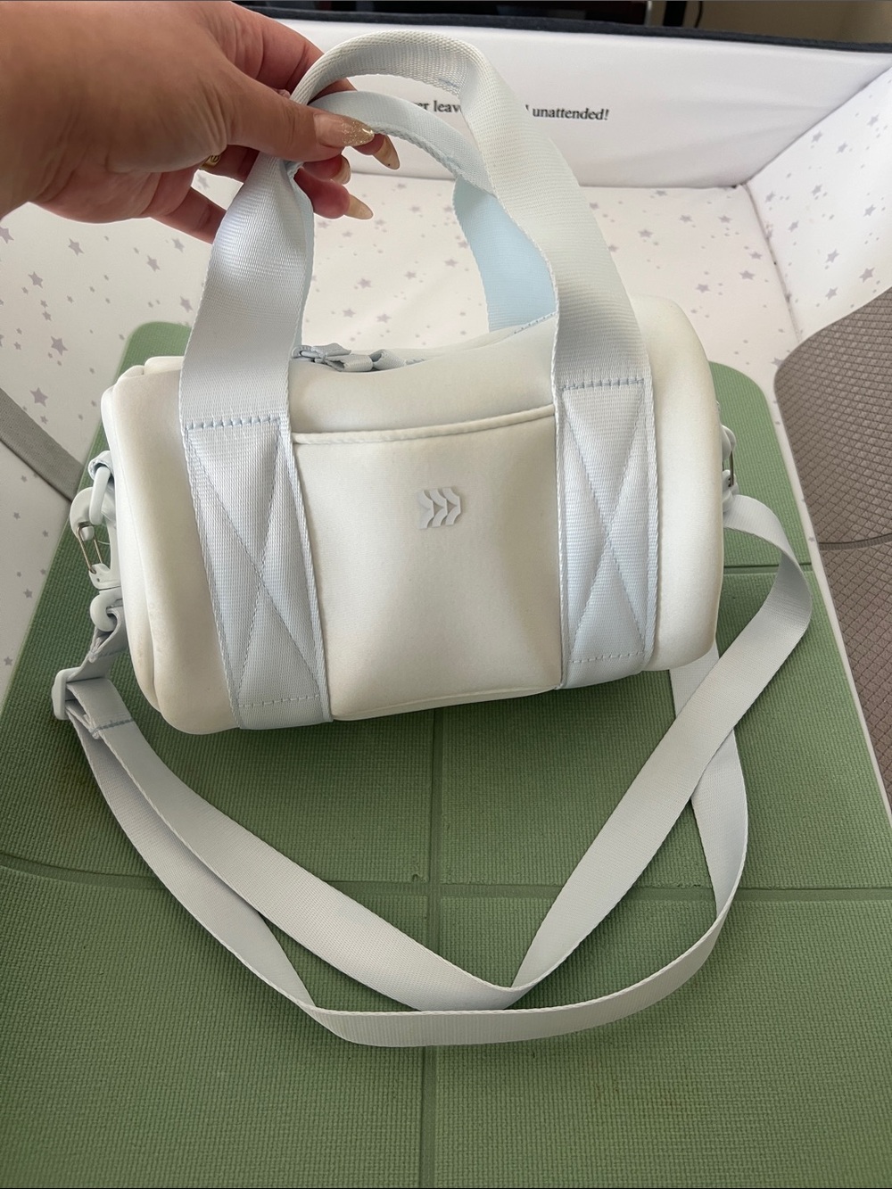 Small white duffel bag